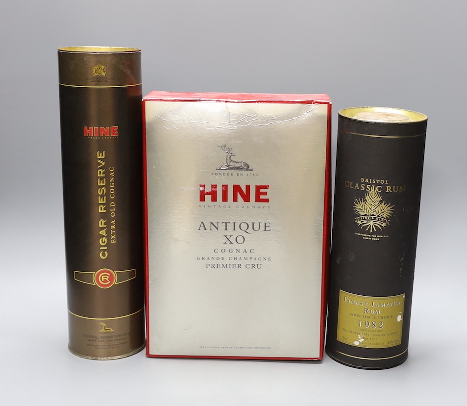 A boxed magnum of Hine Antique XO Cognac Grand Champagne Premier Cru, a boxed Hine Cigar Reserve Extra Old Cognac and one boxed Bristol Classic Rum Finest Jamaican Rum Directoe's Choice 1982.